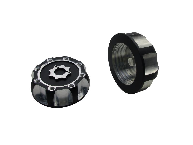 precision CNC machined aluminum gas cap with anodized finish and secondary machining for contrast surface features