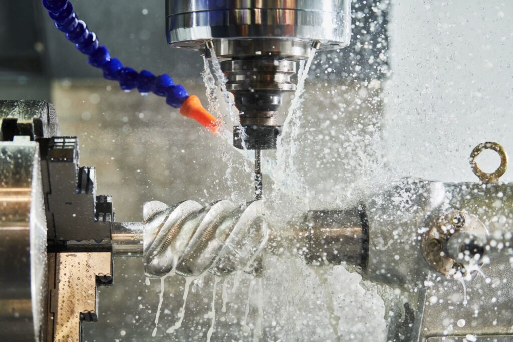 Precision CNC machining process with coolant spraying during metal part machining