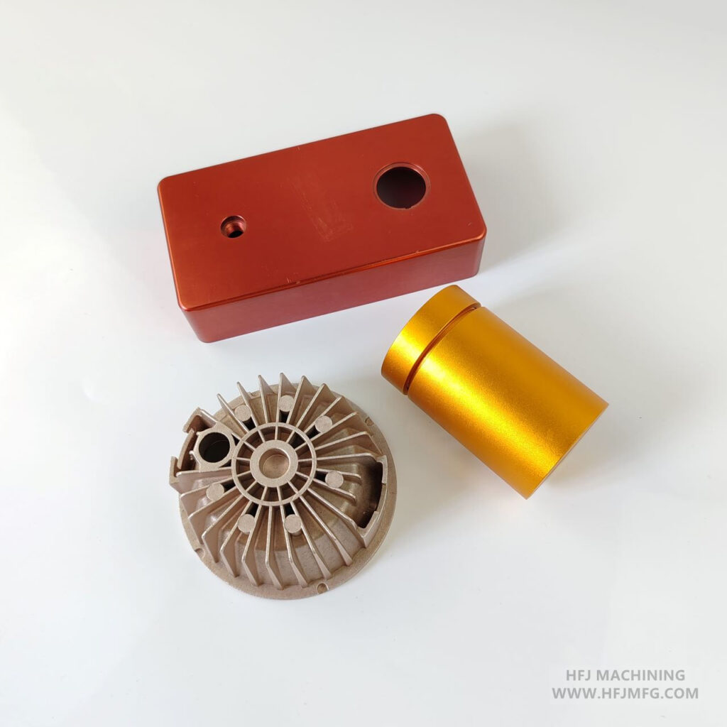 Color anodized aluminum parts with red and gold surface finish