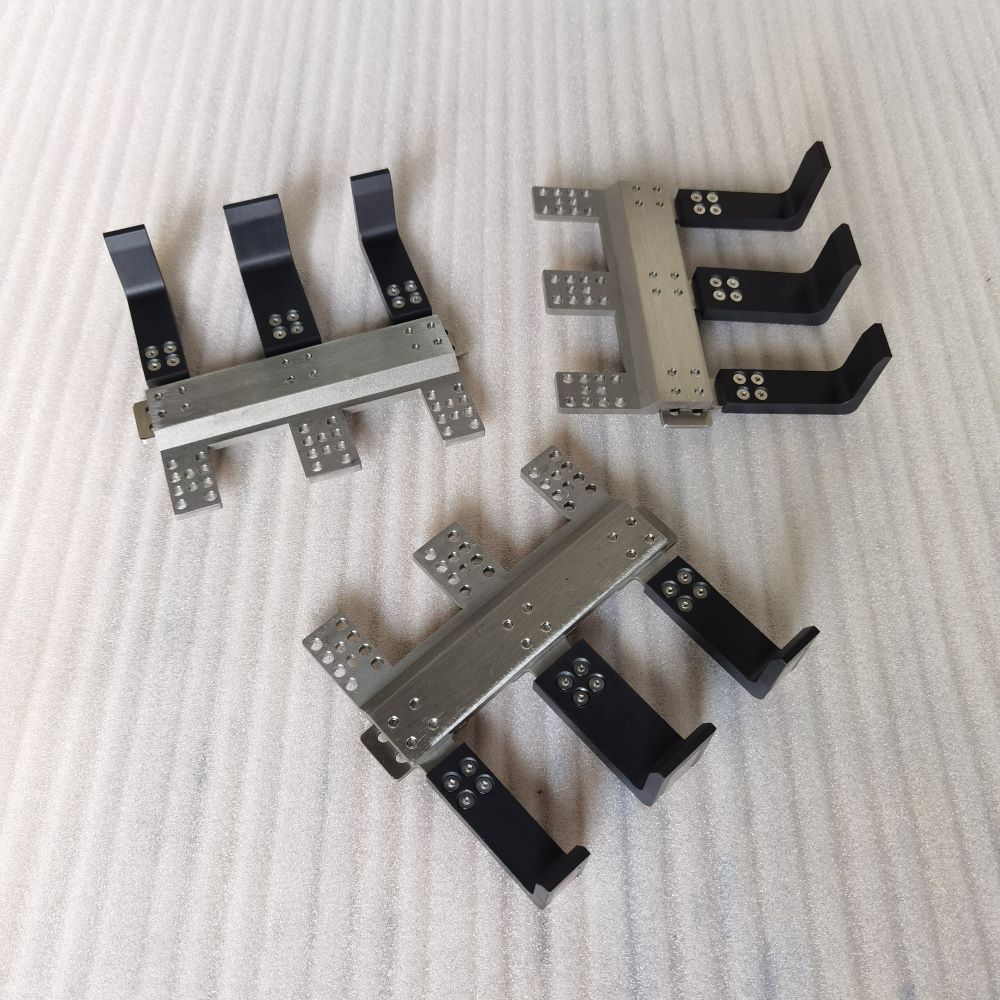 Aluminum CNC machined assembly with multiple parts, precision holes and structural brackets