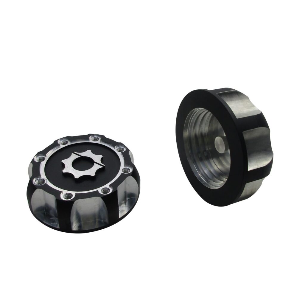 precision CNC machined aluminum gas cap with anodized finish and secondary machining for contrast surface features
