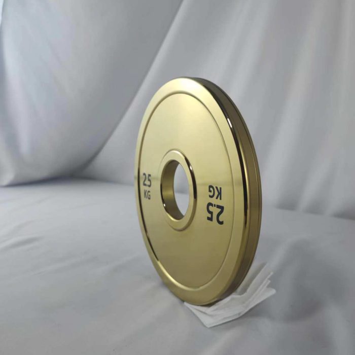 Precision machined steel weight plate with gold titanium PVD coating and mirror surface finish